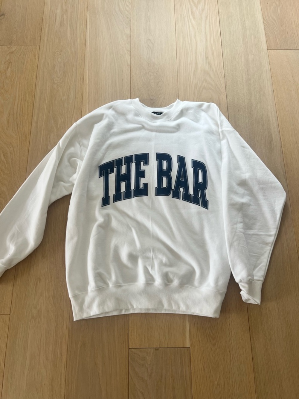 The Bar White Crewneck Sweatshirt with Navy Logo